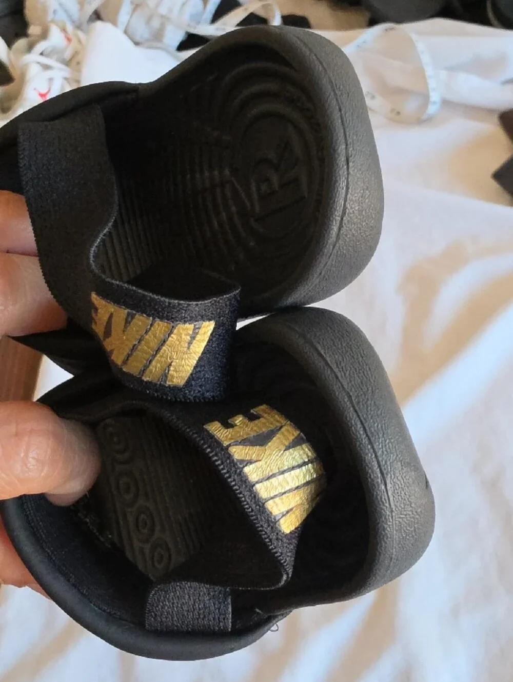 Nike Toddler Black Slide Sandals with Gold Swoosh